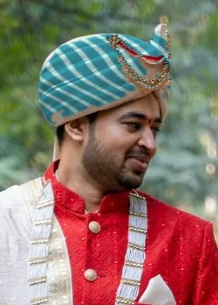 Advait in a Peacock teal safa